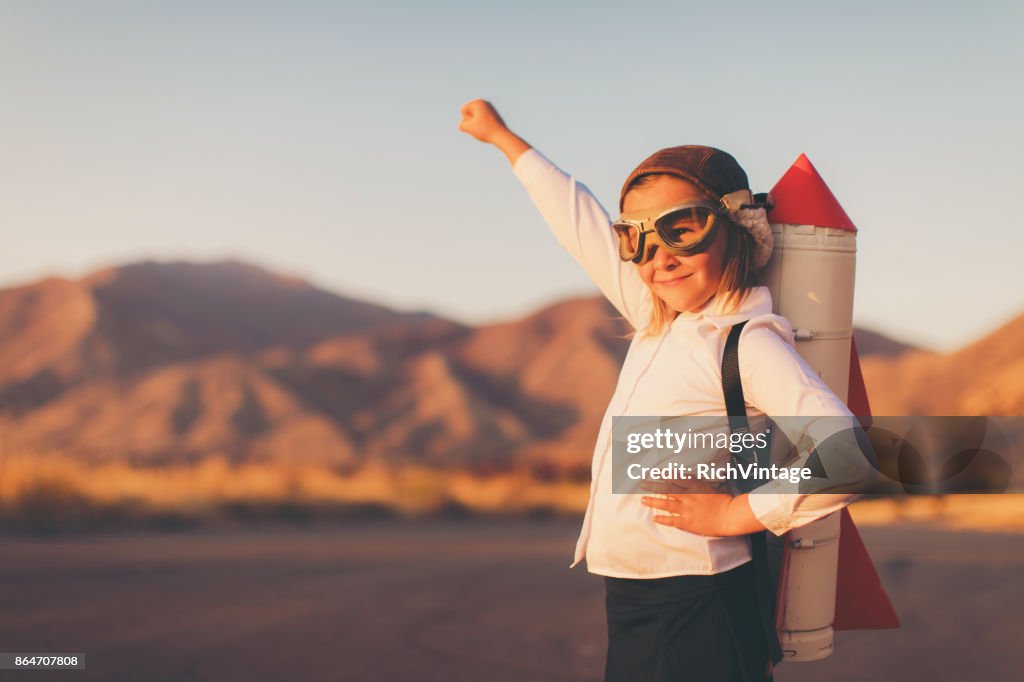 Young Business Girl with Rocket Pack