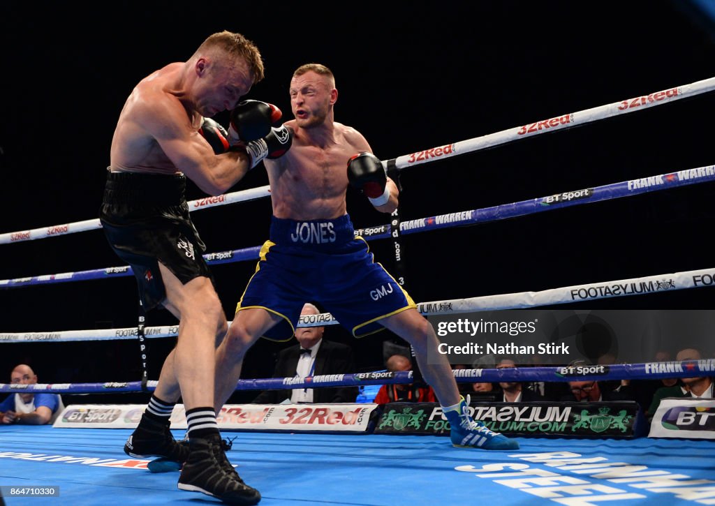 Damon Reed Boxer Damon Jones lands a shot on James Metcalf during the Official... News ...