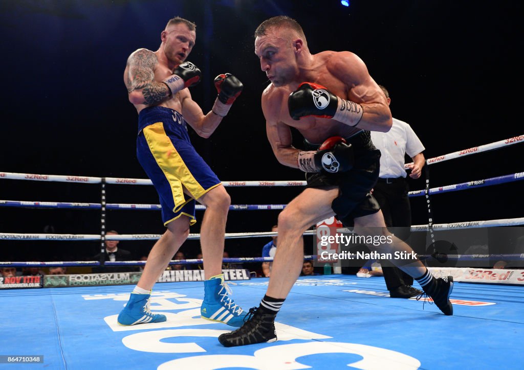 Damon Reed Boxer James Metcalf lands a shot on Damon Jones during the Official... News ...