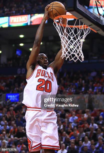 Quincy Pondexter of the Chicago Bulls dunks the ball during to the first half of an NBA game against the Toronto Raptors at Air Canada Centre on...