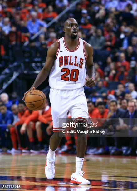 Quincy Pondexter of the Chicago Bulls dribbles the ball during to the first half of an NBA game against the Toronto Raptors at Air Canada Centre on...