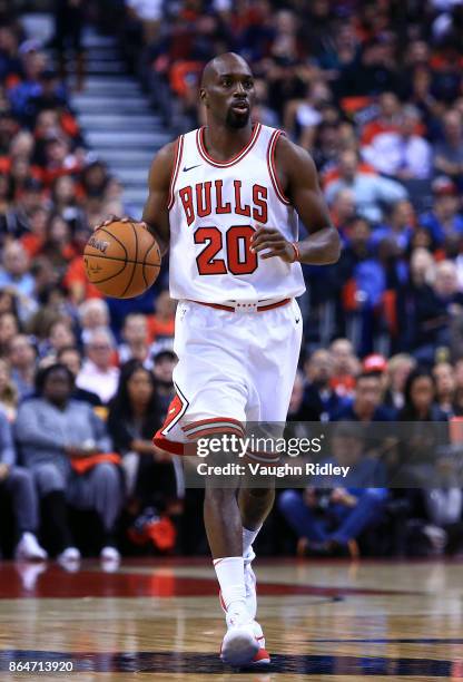 Quincy Pondexter of the Chicago Bulls dribbles the ball during to the first half of an NBA game against the Toronto Raptors at Air Canada Centre on...