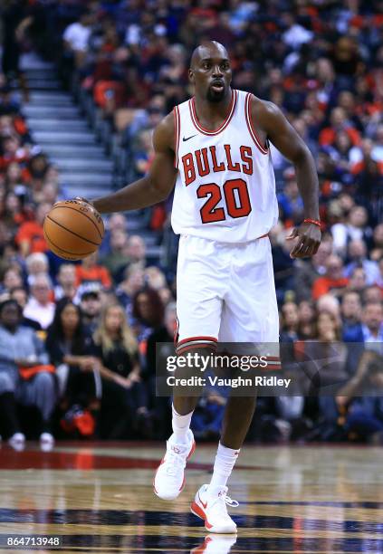 Quincy Pondexter of the Chicago Bulls dribbles the ball during to the first half of an NBA game against the Toronto Raptors at Air Canada Centre on...