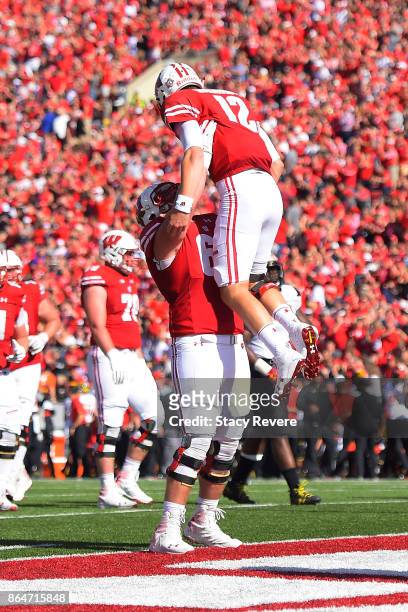 Beau Benzschawel of the Wisconsin Badgers celebrates a touchdown with Alex Hornibrook during a game against the Maryland Terrapins at Camp Randall...
