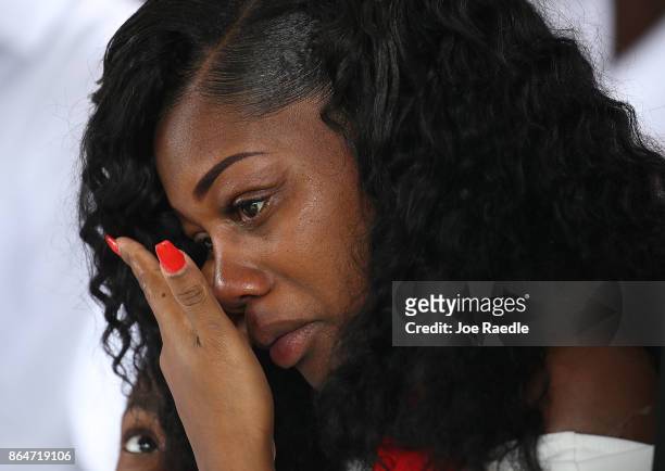 Myeshia Johnson wipes away tears during the burial service for her husband U.S. Army Sgt. La David Johnson at the Memorial Gardens East cemetery on...