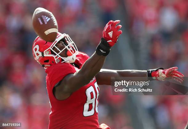 Jerome Washington of the Rutgers Scarlet Knights can't make a catch as the ball grazes off his fingertips against the Purdue Boilermakers during the...