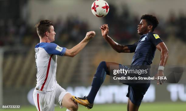 Chris Durkin of the United States battles for the ball with Jonathan Panzo of England during the FIFA U-17 World Cup India 2017 Quarter Final match...