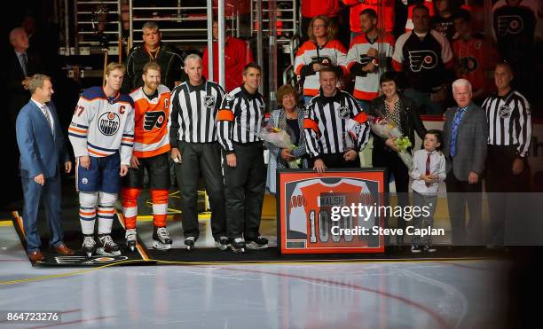 Referee Ian Walsh is honored in a pregame ceremony to celebrate his 1000th NHL game officiated on October 21, 2017 at the Wells Fargo Center in...