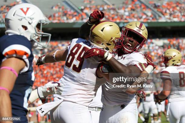 Tommy Sweeney and Jon Hilliman of the Boston College Eagles celebrate a touchdown in the third quarter during a game against the Virginia Cavaliers...