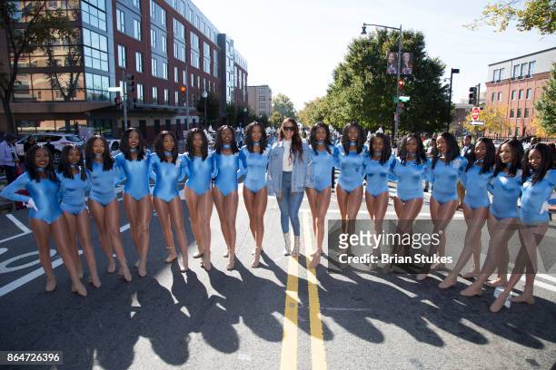 Lala Anthony poses with Eastern Senior High School Band Dancers while attending Howard University Homecoming Parade as 2017 Grand Marshall at Howard...