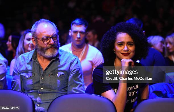 Game of Thrones actors Nathalie Emmanuel and Liam Cunningham watch on from ringside during the Ryan Burnett of Northern Ireland versus Zhanat...