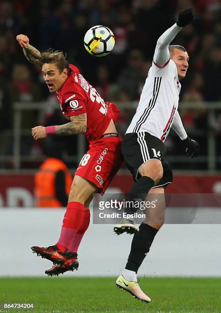 Andrey Yeshchenko of FC Spartak Moscow vies for the ball with Stanislav Prokofyev of FC Amkar Perm during the Russian Premier League match between FC...