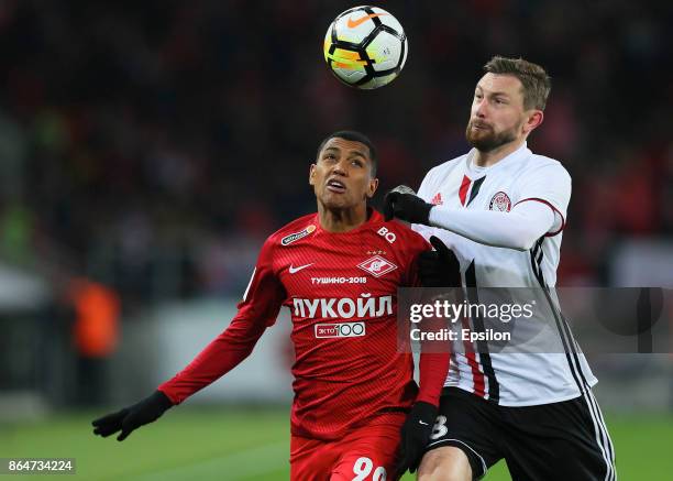 Pedro Rocha of FC Spartak Moscow vies for the ball with Mikhail Sivakov of FC Amkar Perm during the Russian Premier League match between FC Spartak...