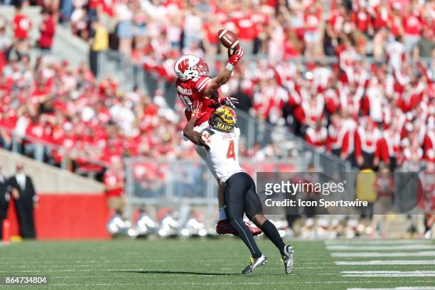 Wisconsin Badger tight end Troy Fumagalli can't hang onto the pass as Maryland Terrapin defensive back Darnell Savage Jr. Defends during a Big Ten...