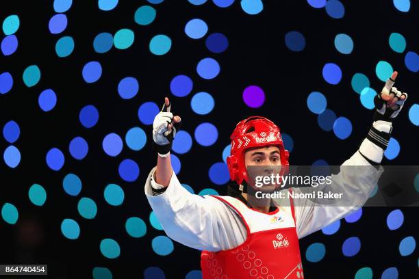 Mikhail Artamonov of Russia celebrates after winning during the 2017 WTF World Taekwondo Grand-Prix Series at the Copper Box Arena on October 21,...