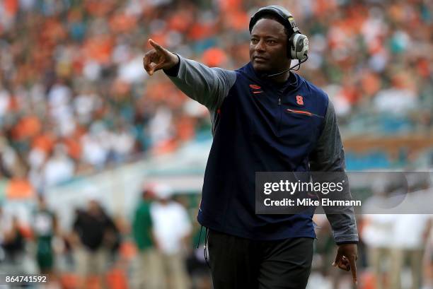 Head coach Dino Babers of the Syracuse Orange looks on during a game against the Miami Hurricanes at Sun Life Stadium on October 21, 2017 in Miami...