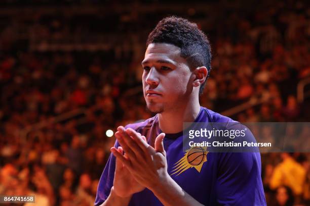 Devin Booker of the Phoenix Suns stands on the court before the NBA game against the Los Angeles Lakers at Talking Stick Resort Arena on October 20,...
