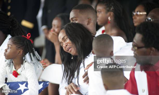 Cowanda Jones-Johnson cries during the burial service for her son U.S. Army Sgt. La David Johnson at the Memorial Gardens East cemetery on October...