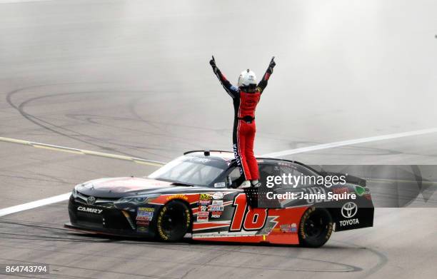 Christopher Bell, driver of the JBL Toyota, celebrates winning the NASCAR XFINITY Series Kansas Lottery 300 at Kansas Speedway on October 21, 2017 in...