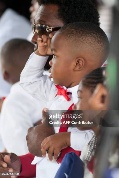 La David Johnson Jr. Salutes his father US Army Sgt. La David Johnson during his burial service at the Memorial Gardens East cemetery on October 21,...
