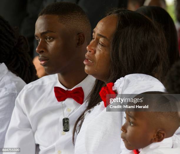 Cowanda Jones-Johnson, , the aunt of Sgt. La David Johnson, weeps during his burial service at Fred Hunter's Hollywood Memorial Gardens in Hollywood,...