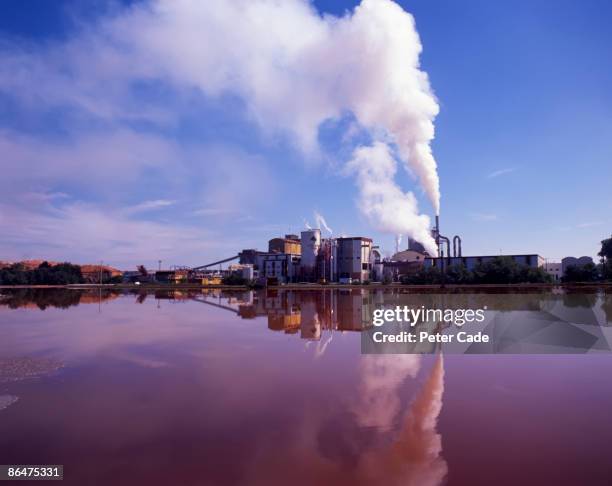 factory over water - pulp stock pictures, royalty-free photos & images