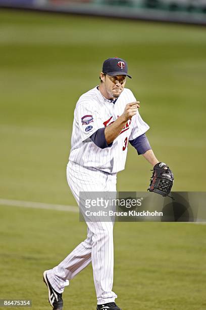 Joe Nathan of the Minnesota Twins celebrates his save and the team's win over the Los Angeles Angels at the Metrodome on April 17, 2009 in...