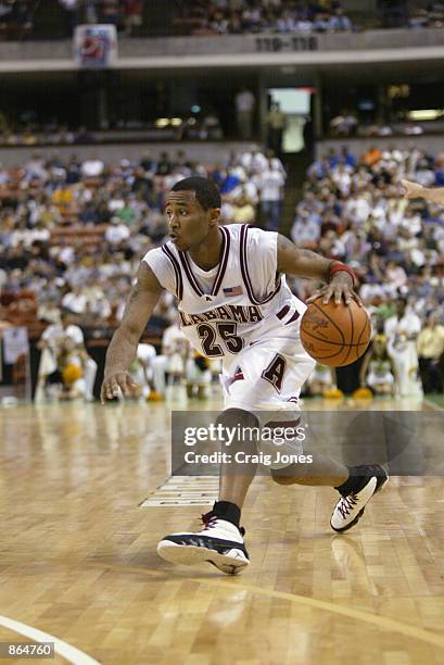 Guard Maurice Williams of the Alabama Crimson Tide dribbles the ball against the Kent State Golden Flashes during the game on March 16, 2002 at Bi-Lo...