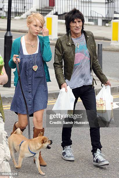 Ronnie Wood and girlfriend Ekaterina Ivanova enjoy the sunshine on April 21, 2009 in London, England.