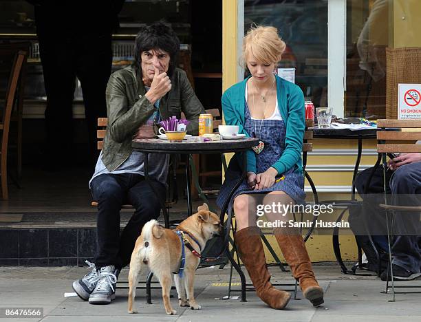 Ronnie Wood and girlfriend Ekaterina Ivanova enjoy the sunshine on April 21, 2009 in London, England.