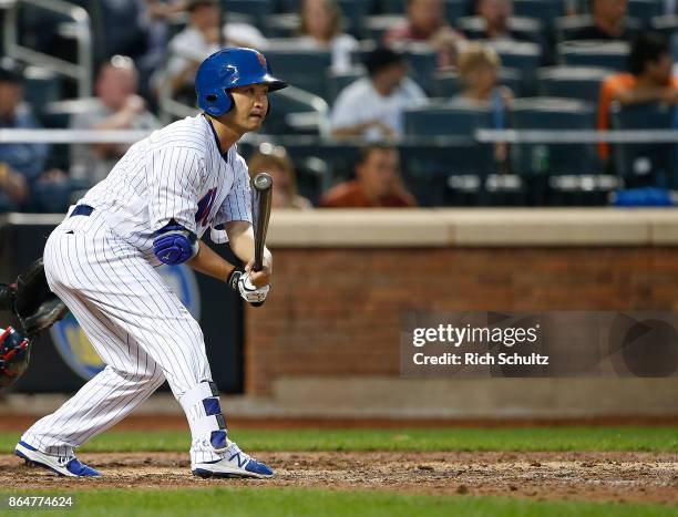 Norichika Aoki of the New York Mets grounds out in the eighth inning of the first game of a double header against the Atlanta Braves at Citi Field on...