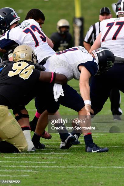 Devlin Hodges quarterback Samford University Bulldogs is stripped of the football by Brandon Curtis defensive linebacker Wofford College Terriers in...