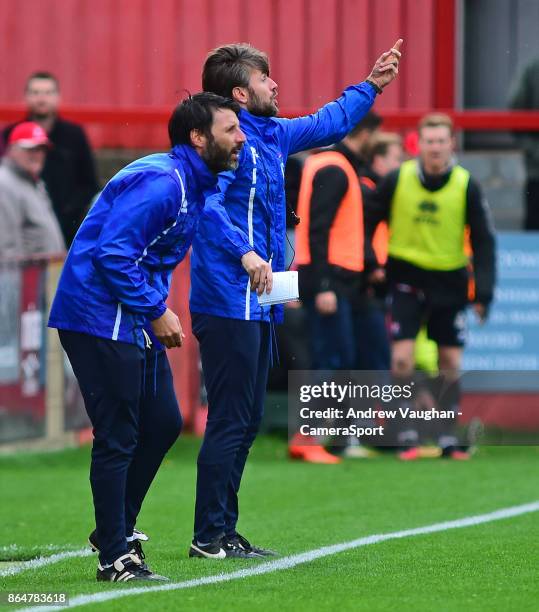 Lincoln City manager Danny Cowley and assistant manager Nicky Cowley shout instructions to their team from the technical area during the Sky Bet...