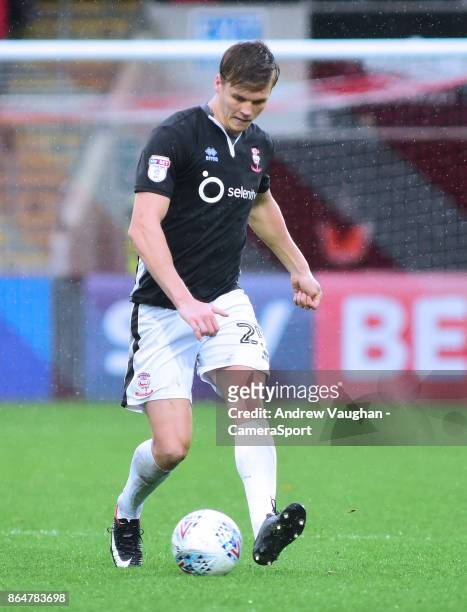 Lincoln City's Sean Raggett during the Sky Bet League Two match between Cheltenham Town and Lincoln City at Whaddon Road on October 21, 2017 in...