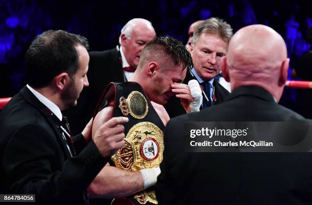 An emotional Ryan Burnett of Northern Ireland celebrates after his bout with Zhanat Zhakiyanov of Kazakhstan for the IBF, WBO and IBO World...