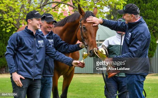 Tom Dabernig, David Hayes and Ben Hayes with Boom Time after winning the Caulfield Cup at Caulfield Racecourse on October 22, 2017 in Caulfield,...