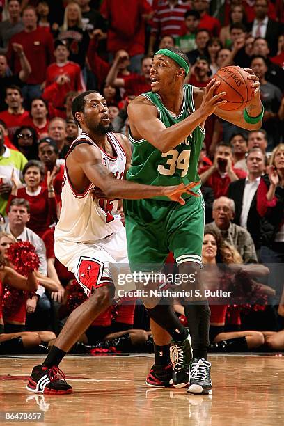 Paul Pierce of the Boston Celtics looks to pass over John Salmons of the Chicago Bulls in Game Six of the Eastern Conference Quarterfinals during the...