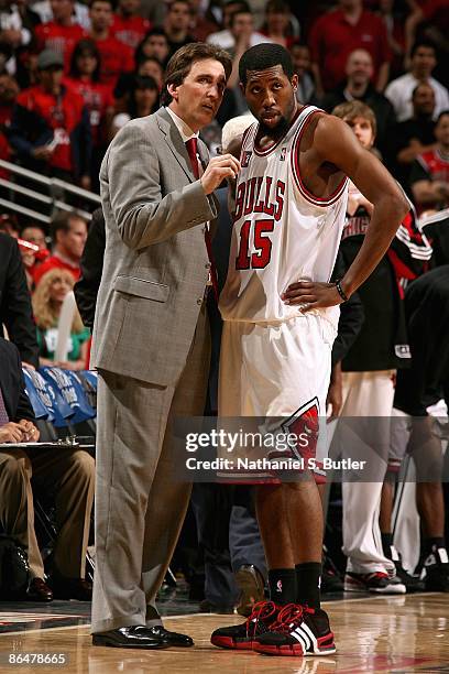 Head coach Vinny Del Negro talks to John Salmons of the Chicago Bulls near the side line in Game Six of the Eastern Conference Quarterfinals against...