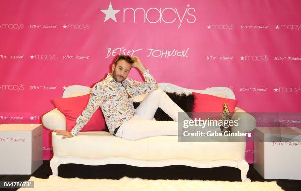 Television personality Micah Jesse poses during an appearance by fashion designer Betsey Johnson at Macy's at the Fashion Show mall on October 21,...