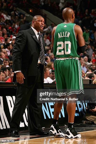 Head coach Doc Rivers talks to Ray Allen of the Boston Celtics near the sideline in Game Six of the Eastern Conference Quarterfinals against the...