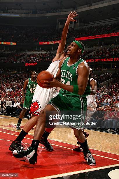 Paul Pierce of the Boston Celtics drives to the basket past Joakim Noah of the Chicago Bulls in Game Six of the Eastern Conference Quarterfinals...