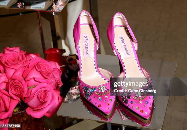 Shoes are displayed during an appearance by fashion designer Betsey Johnson at Macy's at the Fashion Show mall on October 21, 2017 in Las Vegas,...