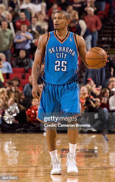 Earl Watson of the Oklahoma City Thunder brings the ball upcourt against the Portland Trail Blazers during the game on April 13, 2009 at the Rose...