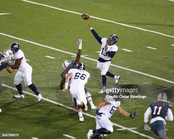 Quarterback Kado Brown of the Georgia Southern Eagles throws a pass during the second half of the game against the Massachusetts Minutemen at McGuirk...