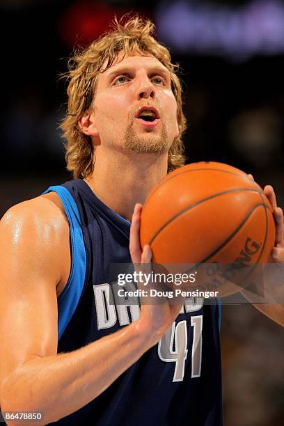 Dirk Nowitzki of the Dallas Mavericks takes a free throw against the Denver Nuggets in Game Two of the Western Conference Semifinals during the 2009...