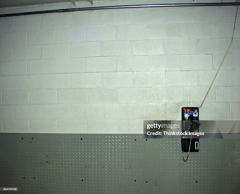 Wall with pay phone