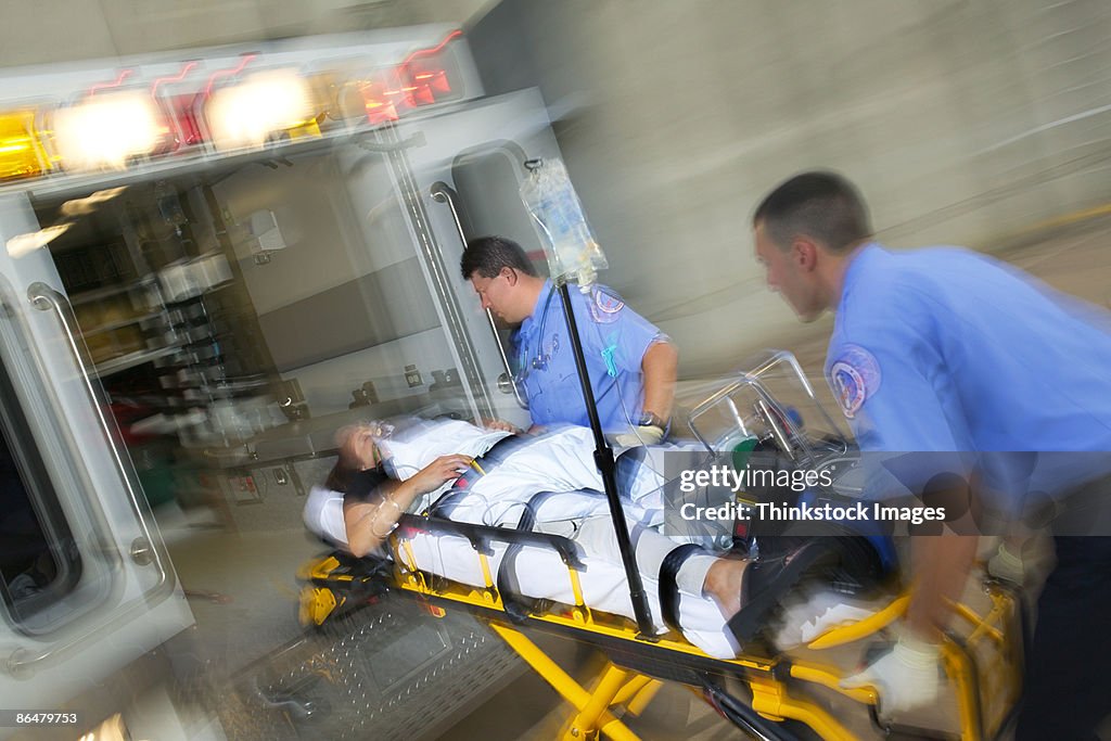 And The Ambulance Died In His Arms Paramedics Loading Patient Into Ambulance High-Res Stock Photo - Getty