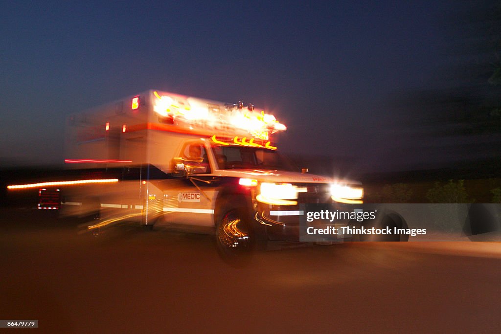 Motion blur of speeding ambulance