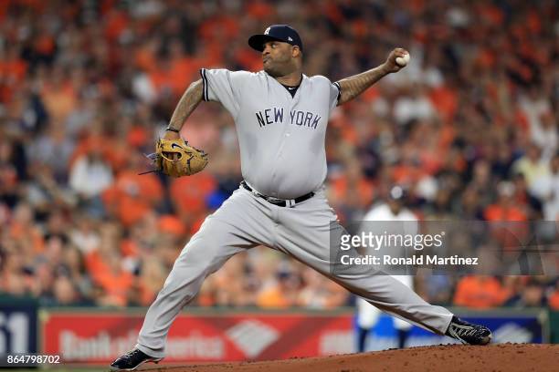 Sabathia of the New York Yankees throws a pitch against the Houston Astros during the first inning in Game Seven of the American League Championship...