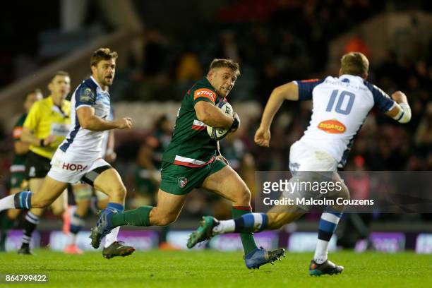 Tom Youngs of Leicester Tigers runs with the ball during the European Rugby Champions Cup match between Leicester Tigers and Castres Olympique at...